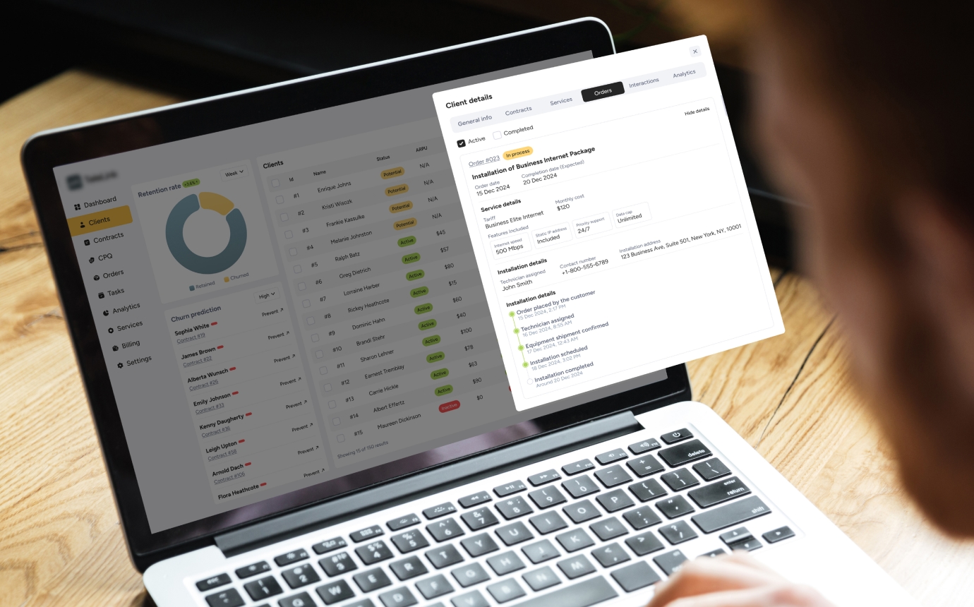 Cropped photo young man using laptop wooden table